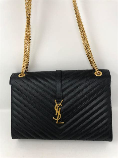 black and gold ysl bag